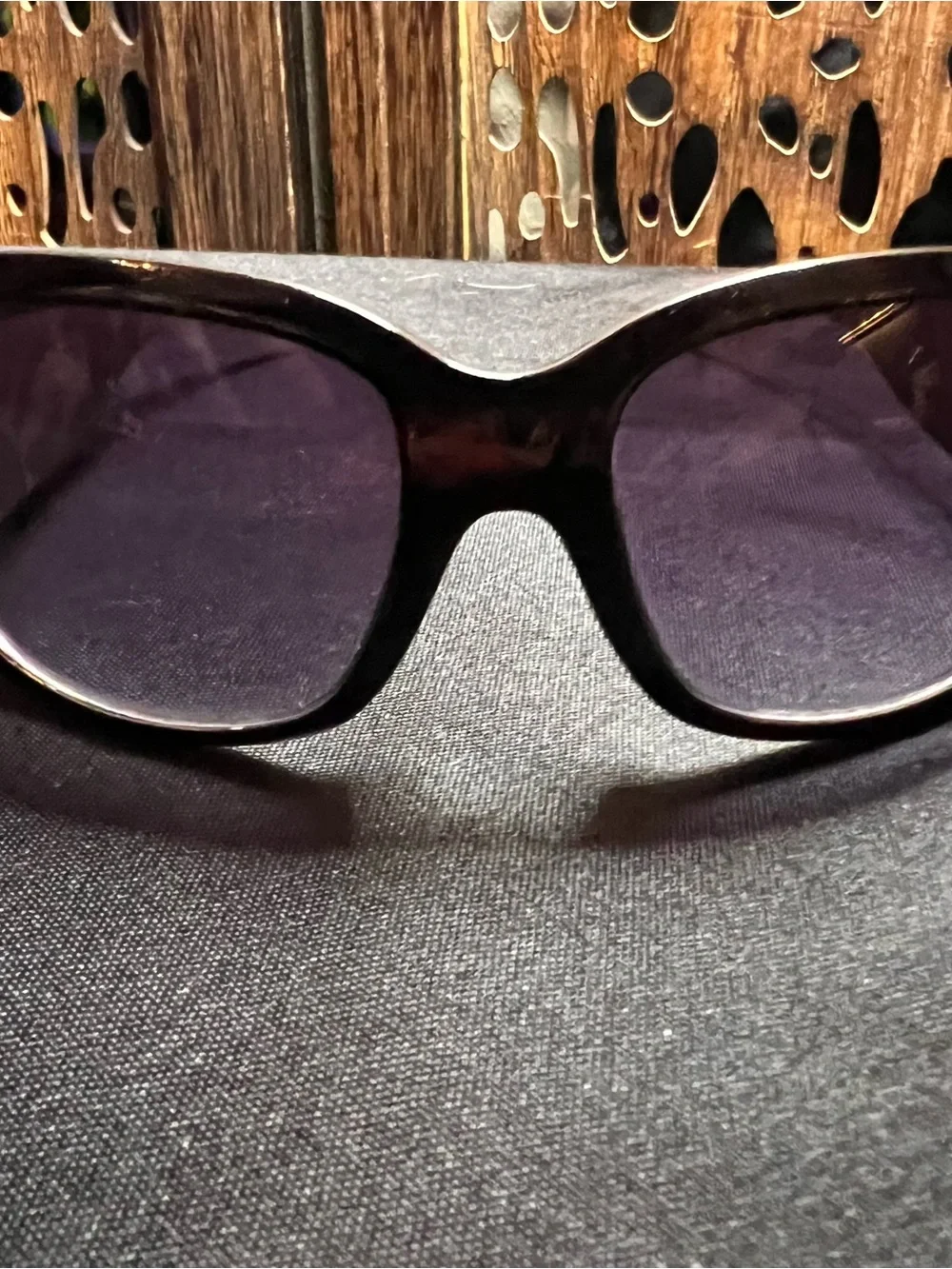 Dolce & Gabbana Black Frame Sunglasses with Dark Purple Lenses